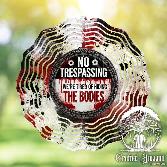No Trespassing We're Tired of Hiding the Bodies Wind Spinner